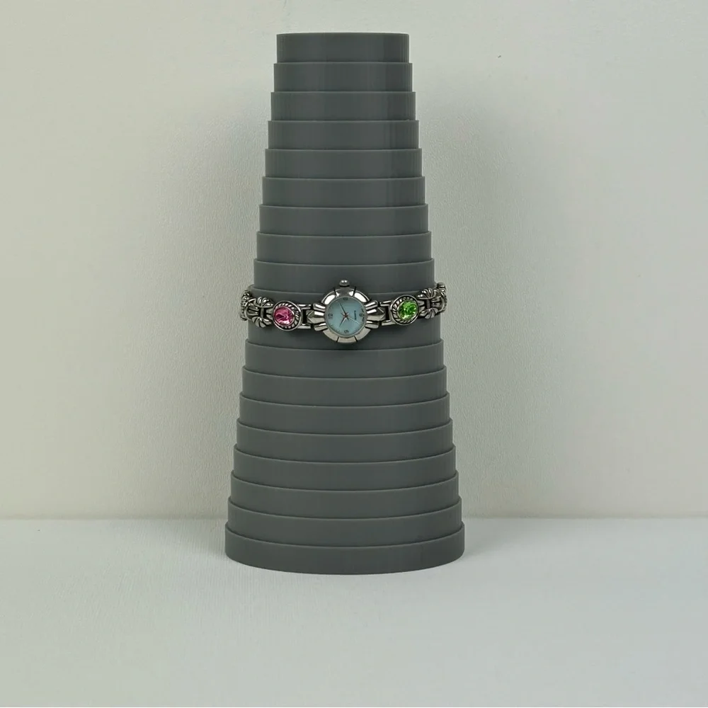 Elegant Silver Tone Quartz watch with Pink, Green, Gold and Blue Accents